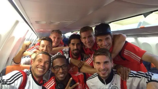 Lukas Podolski and Germany team-mates