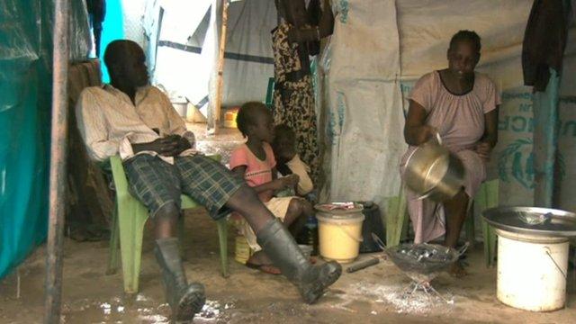 A displaced family in a refugee camp