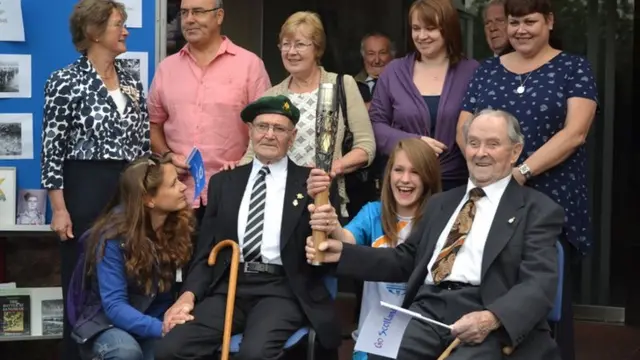 Donald MacKenzie and Peter Ross with the baton