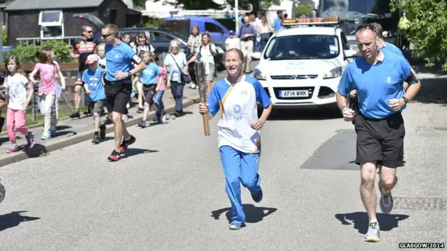 Catherine Whiteside runs through the streets of Lairg