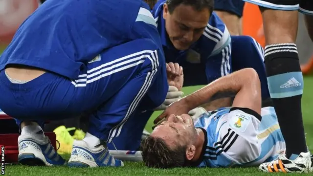 Lucas Biglia lies on the ground