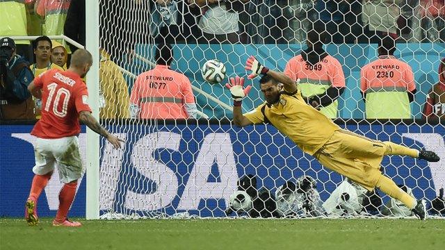 Netherlands' Wesley Sneijder has his penalty saved by Argentina's Sergio Romero