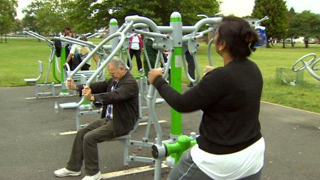 People taking exercise in a park