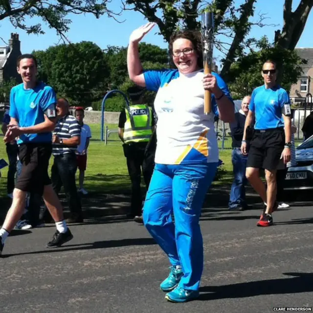 Kirsty Mackay carries baton