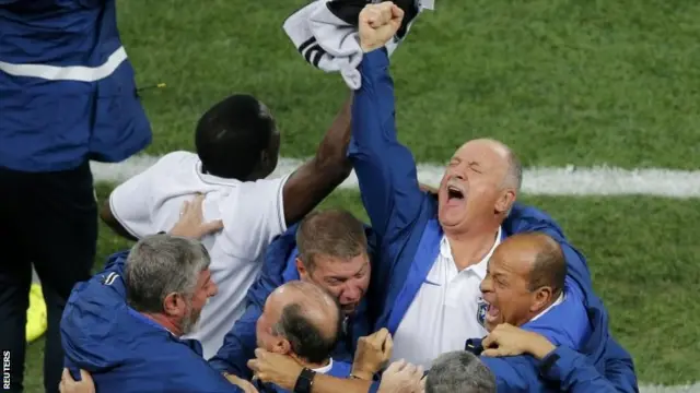 Brazil staff celebrate Neymar's goal