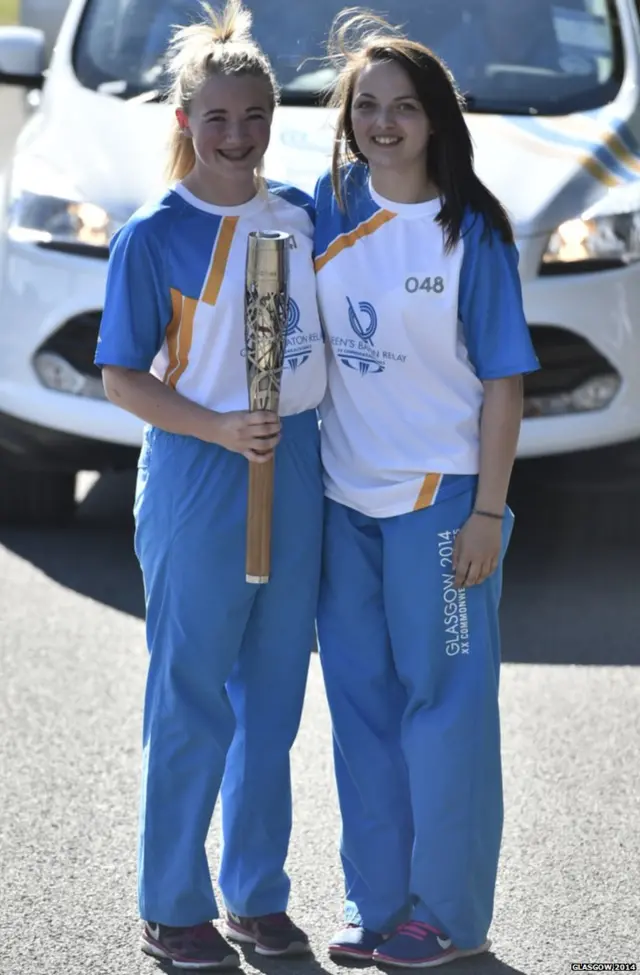 Emily Finlayson (left) hands the baton to Gemma MacLean