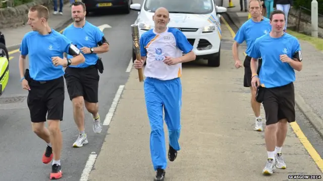 Ashley Woodhouse with the baton