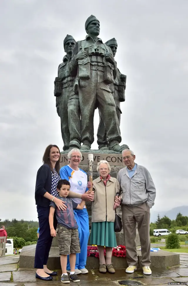 Fiona McEwan with the baton at the Commando memorial