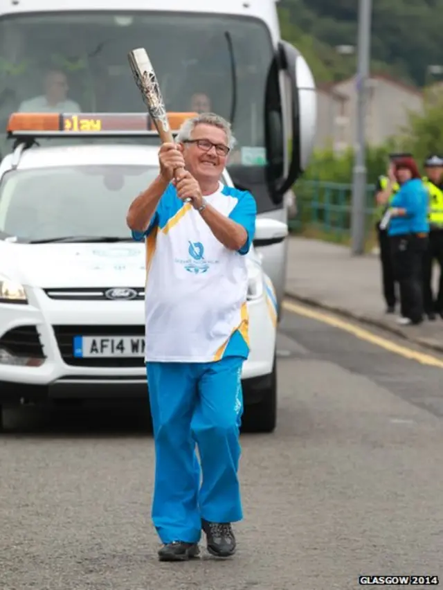 Robert Boyd with the Queen's Baton in Gourock