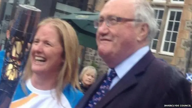 Deputy Provost David Wilson with baton bearer Jackie Fallon