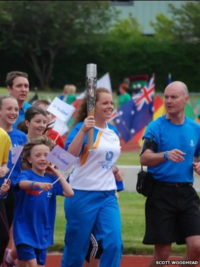 Laura Thomson with the Queen's Baton in Greenock