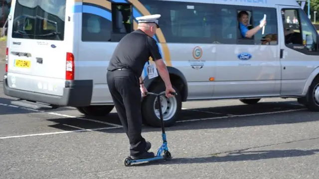 Police officer on a scooter