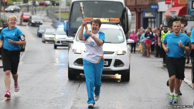 Margaret Barr with the Queen's Baton