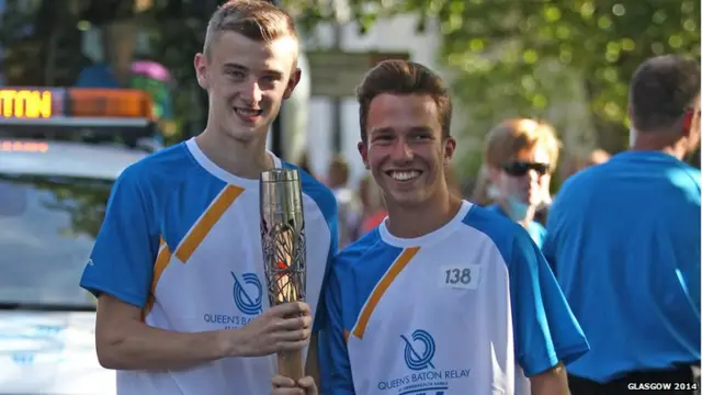 Gavin McArdle hands the baton to Callum Matthews