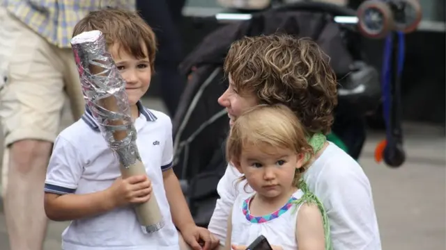 Young boy displays extremely detailed replica baton