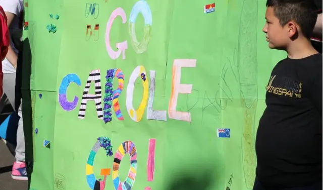 Banner saying "Go Carole go"