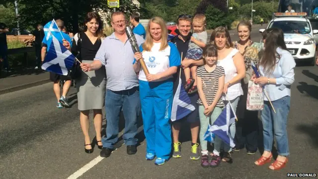 Caroline Keith with the Queen's Baton in Drumchapel