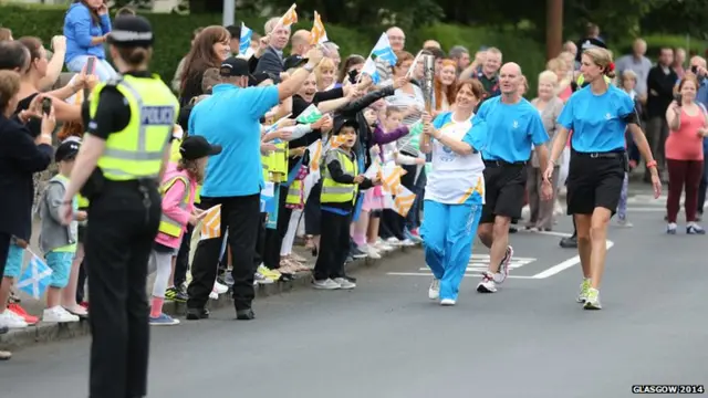 Caroline Paterson with the Queen's Baton