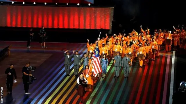 Malaysia enter the stadium