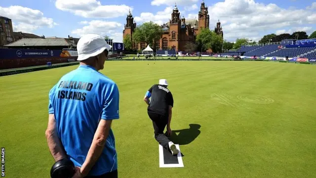 Members of the Falkland Islands Lawn Bowls team participate in a practice session at the Lawn Bowls arena in Kelvingrove Park