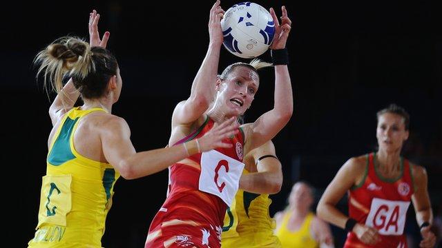 Kyra Jones of Wales secures possession against Australia