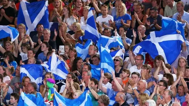 Scotland fans cheer during the evening session at Tollcross International Swimming Centre