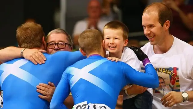 Craig Maclean and Neil Fachie celebrate with their families