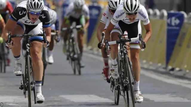 Marianne Vos of the Netherlands, right, crosses the finish line ahead of compatriot Kirsten Wild