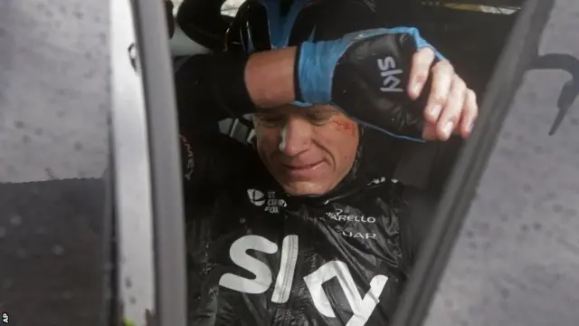 9 July: Britain's Christopher Froome gets into his team car as he abandons the race following a third consecutive crash in two days