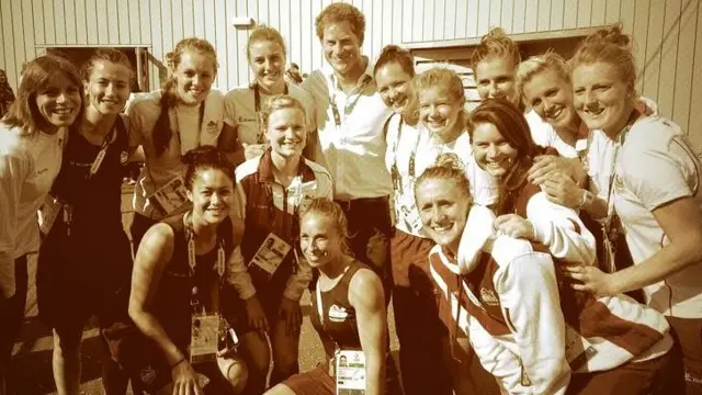 England's women's hockey team have their photo taken with Prince Harry