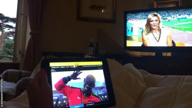 Katarina Johnson-Thompson's view in hotel room shows two screens showing bbc CG coverage