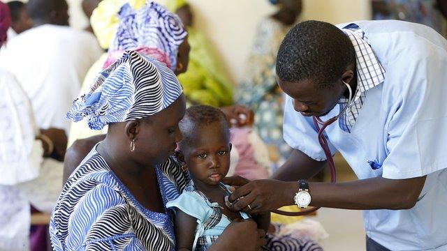 Children being examined by doctors