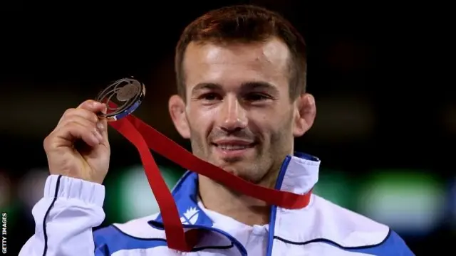 Viorei Etko of Scotland with his silver medal