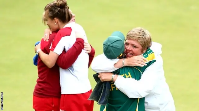 Tracy-Lee Botha and Colleen Piketh of South Africa celebrate winning the Gold Medal in the Women's Pairs Final against Jamie-Lea Winch and Natalie Melmore of England