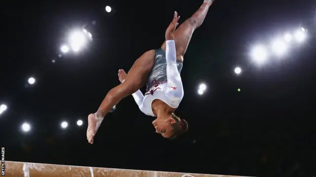 Beckie Downie of England on the beam