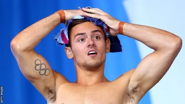 Tom Daley warms up