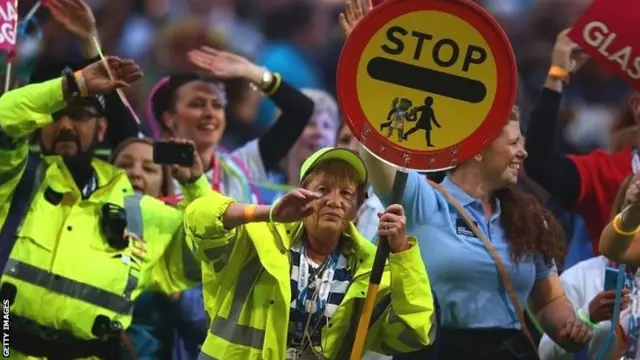 The City Workers enter the stadium