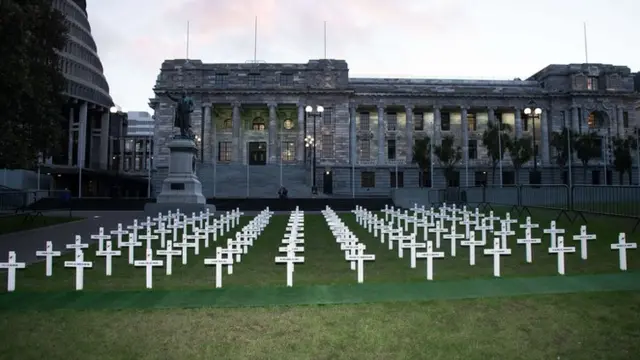 White crosses outside Parliament grounds in Wellington, New Zealand