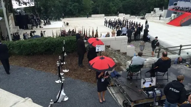 Poppy umbrellas in Liege as we await the arrival of the Duke and Duchess of Cambridge