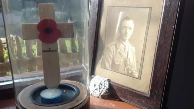 Image of poppy and photograph of Edwin Cashmore