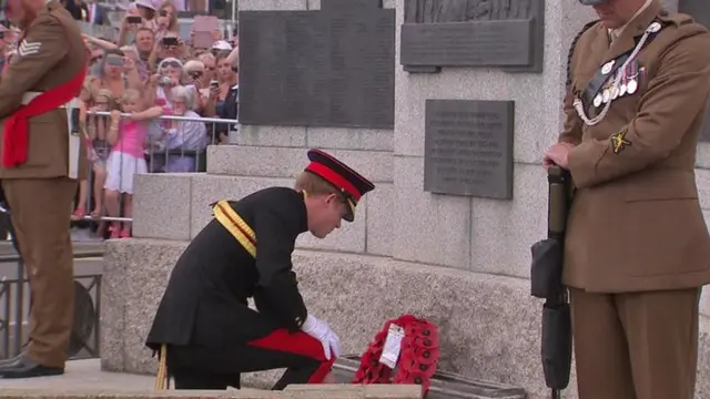 Prince Harry lays a wreath at the war memorial in Folkestone.