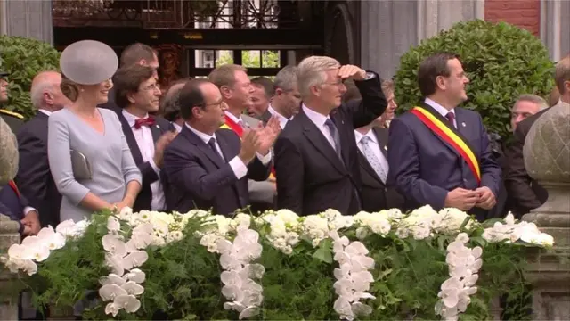 Dignitaries watch the flypast in Liege, Belgium