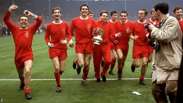 Ian St John (far left) celebrates with Liverpool team-mates after their victory in the 1965 FA Cup final