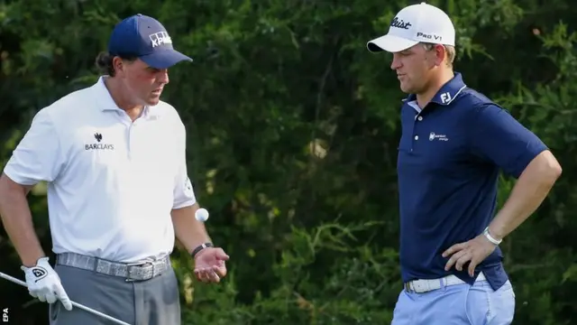 Bernd Wiesberger (right) with Phil Mickelson in round three