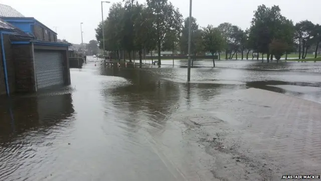 some pics of central elgin within the last hour including main rail line at the station. One shot looks more like a canal than the mainline to Aberdeen!