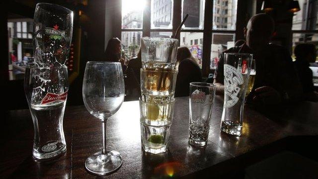 Glasses stacked on a bar