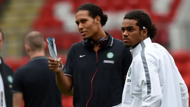 Celtic new boy Jason Denayer (right) checks out the pitch with team-mate Virgil Van Dijk