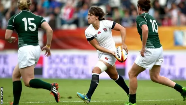 England captain Katy Mclean throws past Nora Stapleton and Niamh Briggs of Ireland