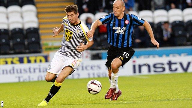 St Mirren midfielder Kenny McLean bursts past Hamilton Accies player-manager Alex Neil