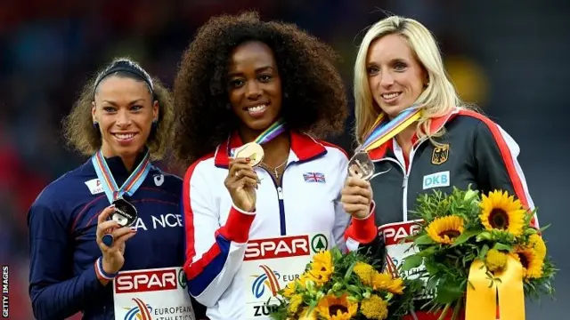 Tiffany Porter receives her hurdles gold medal